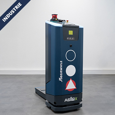 Blue autonomous industrial robot on a gray floor, featuring circular sensors on the front and a small red beacon on top