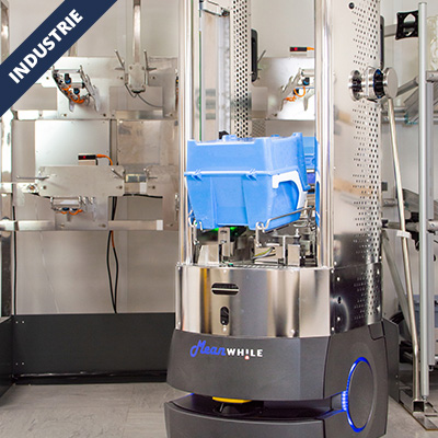 Autonomous industrial robot handling a blue tote in a metal-finished manufacturing cell (automation scene).