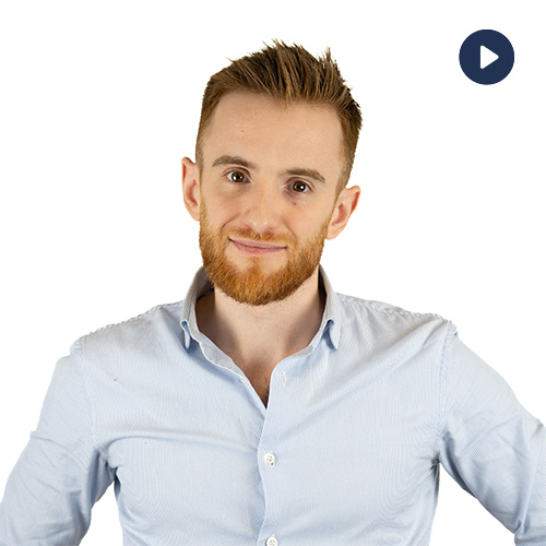 Thumbnail of a smiling man with light brown hair and beard in a light blue shirt, against a white background, with a play button indicating a video